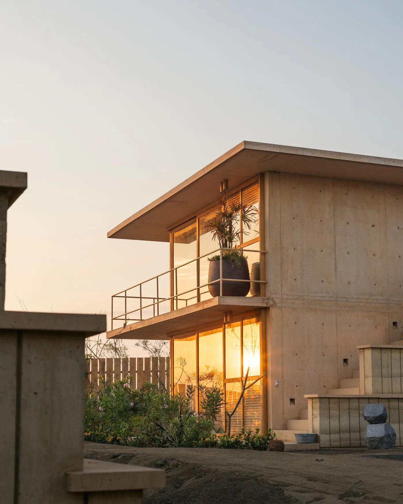 A concrete villa at sunset